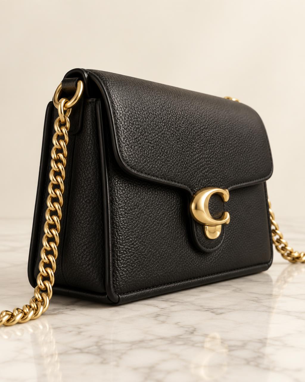 Tabby 19 bag seen from the side showing the structured base